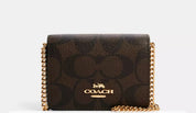 Coach Mini Skinny Negra y Marron