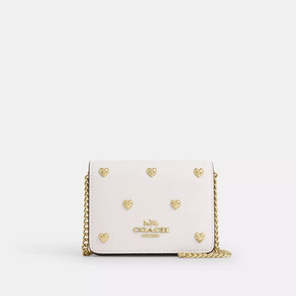 Coach Mini skinny Blanca con Corazones Dorados