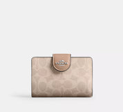 Coach Monedero Crema